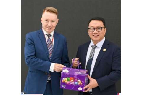 Australian ambassador Marc Innes-Brown and Joel Chua